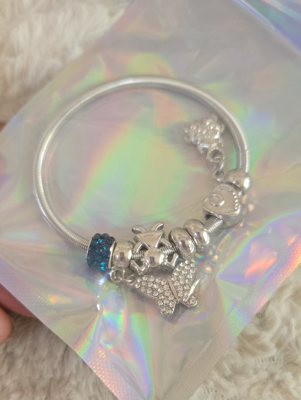 Silver Butterfly Charm Bracelet with Blue Crystal Accent
